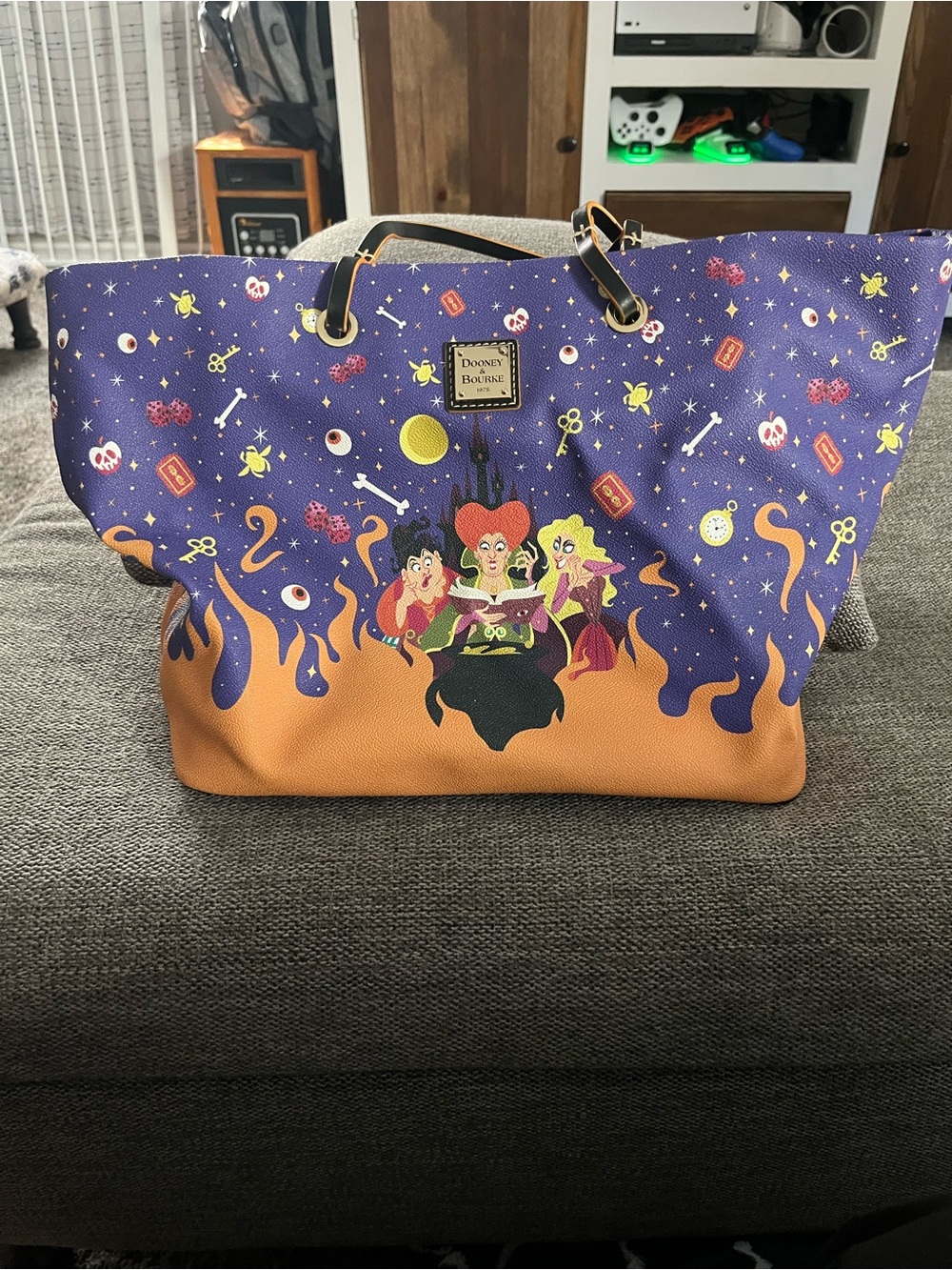 Like new Dooney & Bourke Purple and Orange Hocus Pocus Graphic Tote